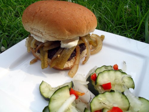 green chile and cream cheese burger with dilly cucumber salad