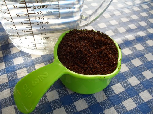 2/3 cup coffee in Tupperware measuring cup